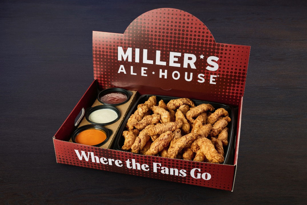 a large red miller's ale house branded box with boneless chicken tenders (zingers) and sauces inside