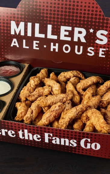 a large red miller's ale house branded box with boneless chicken tenders (zingers) and sauces inside