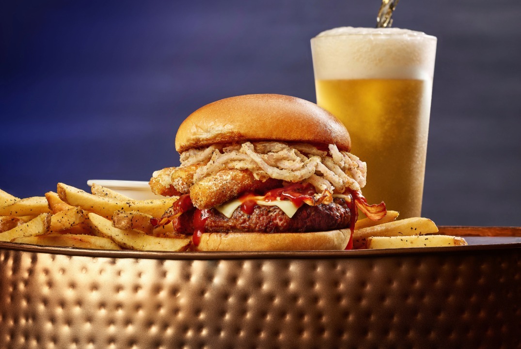 Premium ground beef patty, melted white American cheese, peppered bacon, bbq sauce, 3 Mozzarella Sticks, fried onion tanglers on a toasted bun.