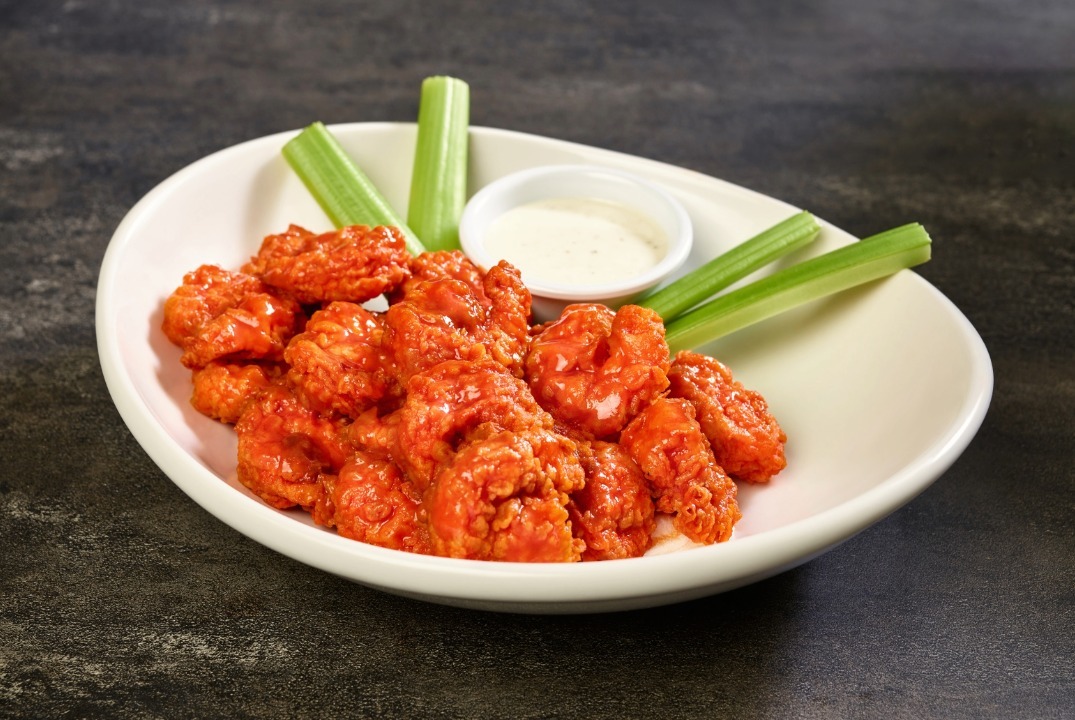 Tossed shrimp in buffalo sauce