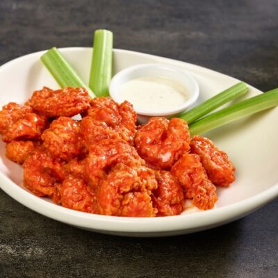 Tossed shrimp in buffalo sauce