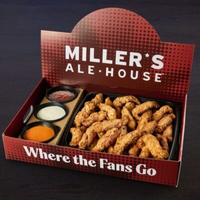 a large red miller's ale house branded box with boneless chicken tenders (zingers) and sauces inside
