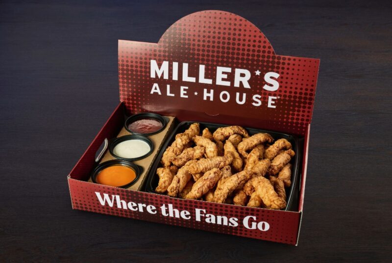 a large red miller's ale house branded box with boneless chicken tenders (zingers) and sauces inside