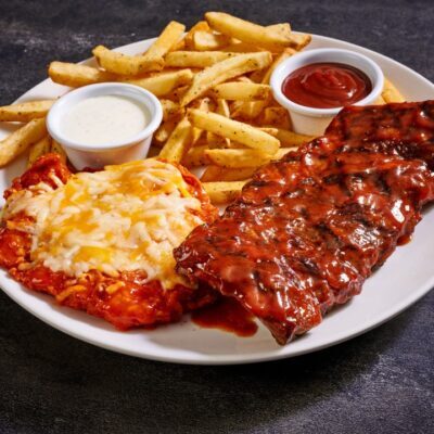 Crispy buttermilk-marinated chicken breast tossed in hot sauce & topped with melted cheese, ½ rack baby back ribs