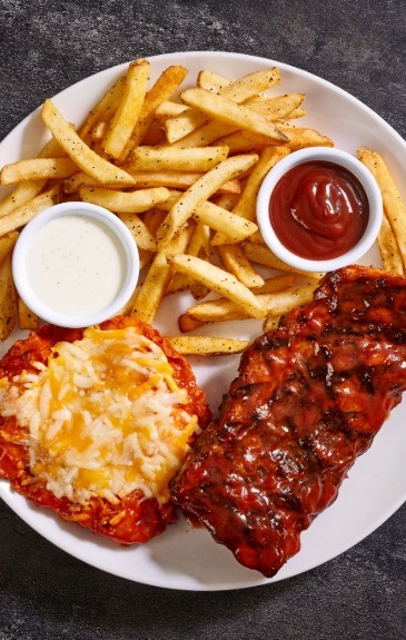 Crispy buttermilk-marinated chicken breast tossed in hot sauce & topped with melted cheese, ½ rack baby back ribs