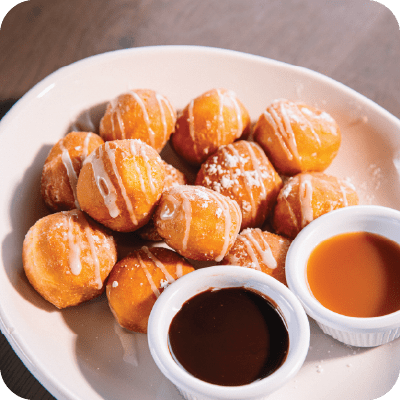 donuts with dipping sauce served on the side